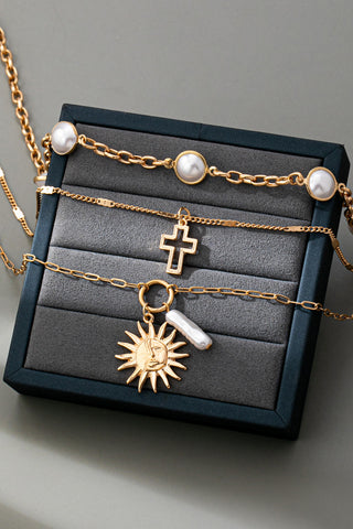 Layered Pearl Sun Cross Charm Necklace