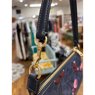 Coach Cherry-Print Shoulder Pouch in navy and Pink