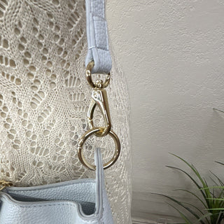 On 34th Light Blue Pebbled Bucket Drawstring Crossbody Bag with Gold Chain