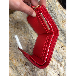 On 34th Red Pebbled Leather Wallet with Gold Bow Accent