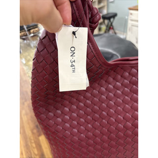 on 34th Woven Wine Shoulder Bag purse