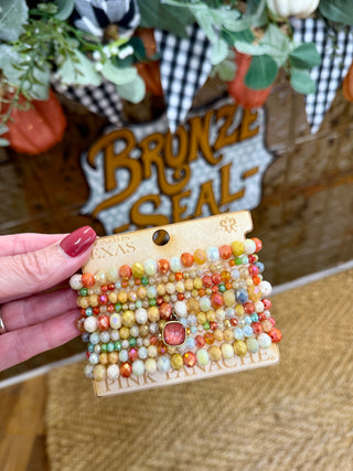 Orange-Multi Bead Nine Strand Bracelet