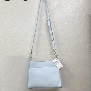 On 34th Light Blue Pebbled Bucket Drawstring Crossbody Bag with Gold Chain